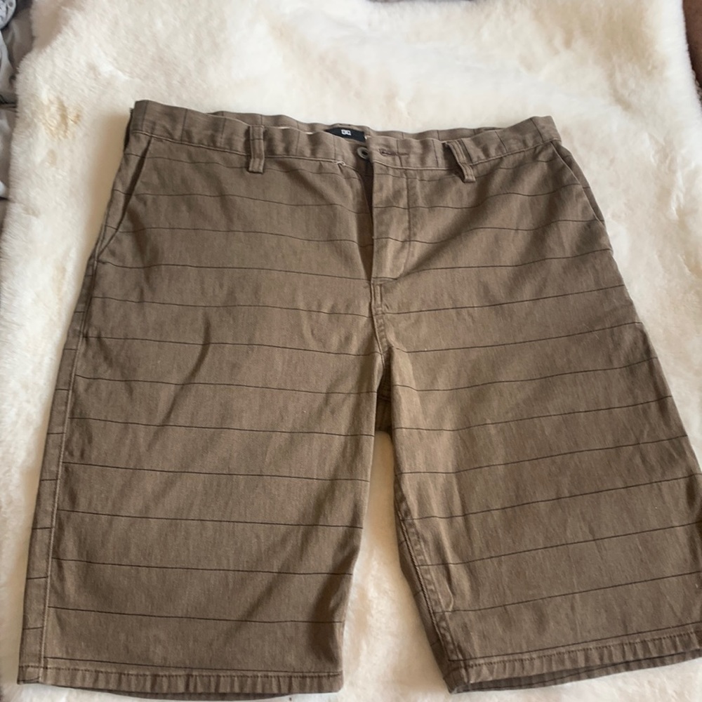 DC size 34 men’s brown and black striped shorts